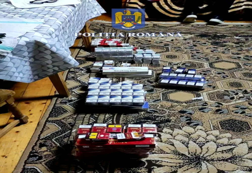 Două persoane reținute, un autoturism, peste 100 de litri de alcool și aproximativ 17.000 de pachete de țigarete, confiscate de polițiști