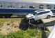 FOTO/ A scăpat ca prin urechile acului după ce mașina în acre se afla a fost lovită de tren